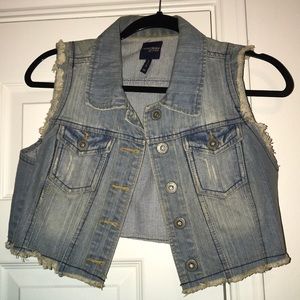 Medium wash jean vest